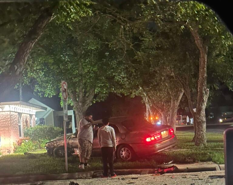 Vehicle Veers Into Yard After Late‑Night Collision on W. Broadway